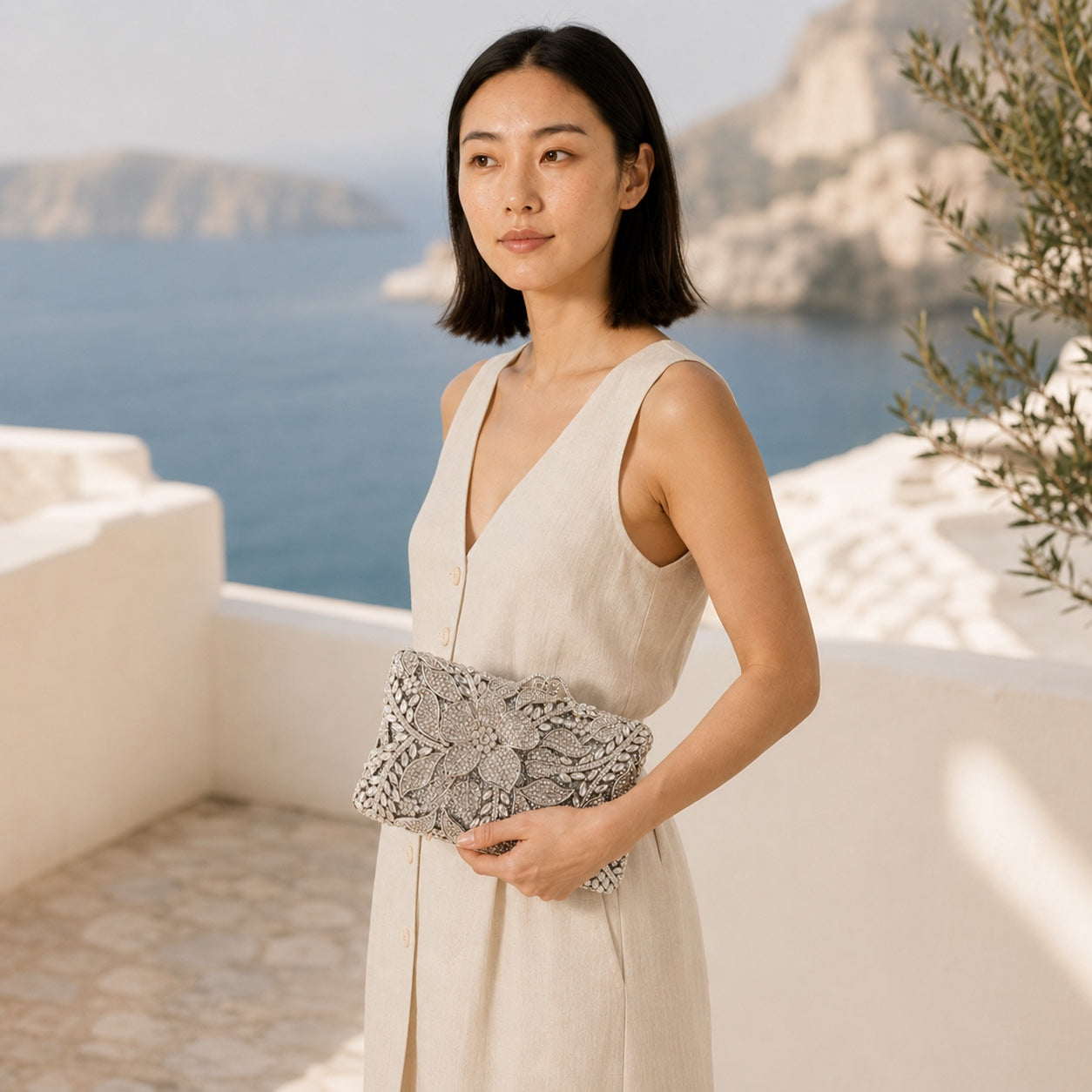 Model wearing the Gallipoli - Straw Clutch, side view