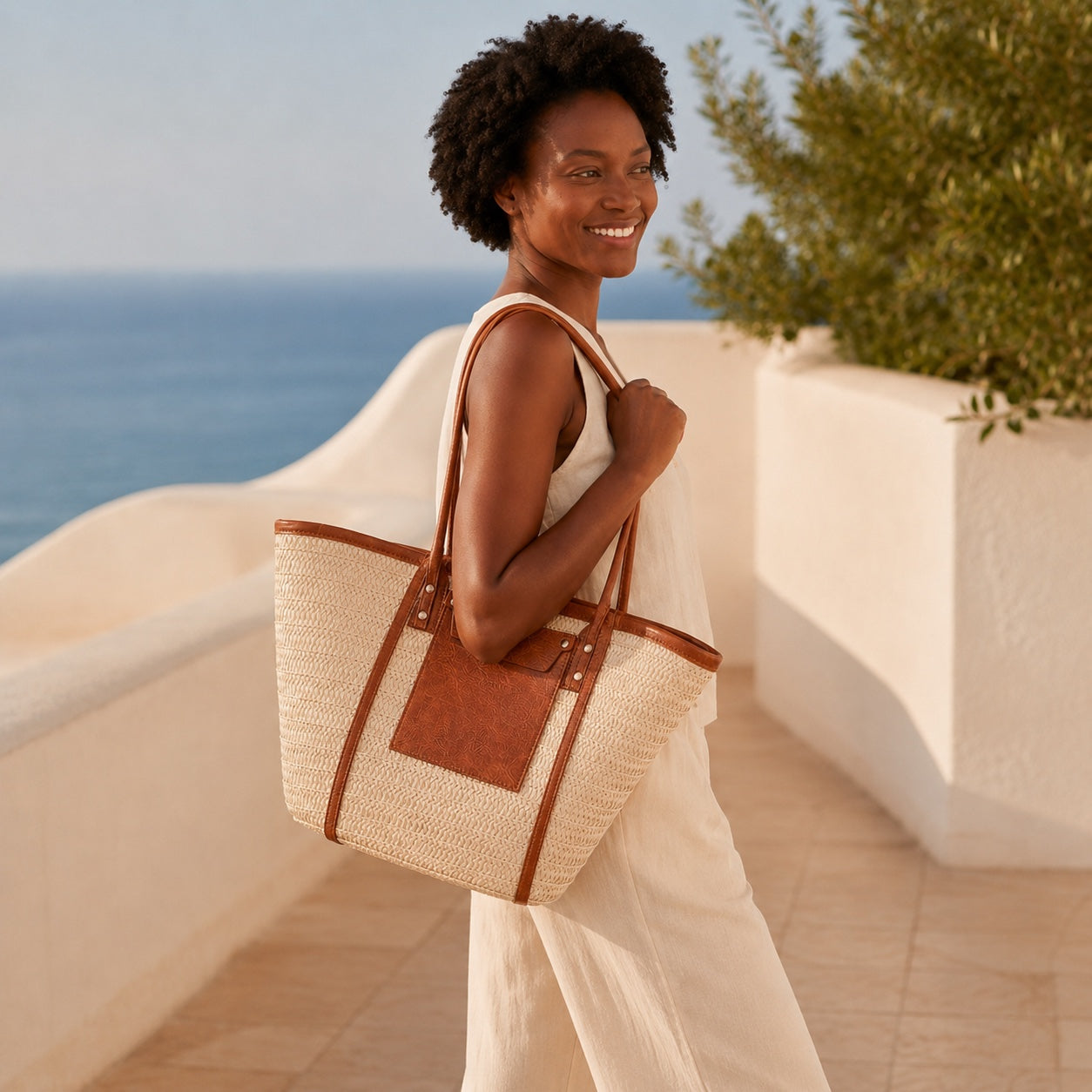 Model wearing the Lavagna - Straw Beach Tote, side view