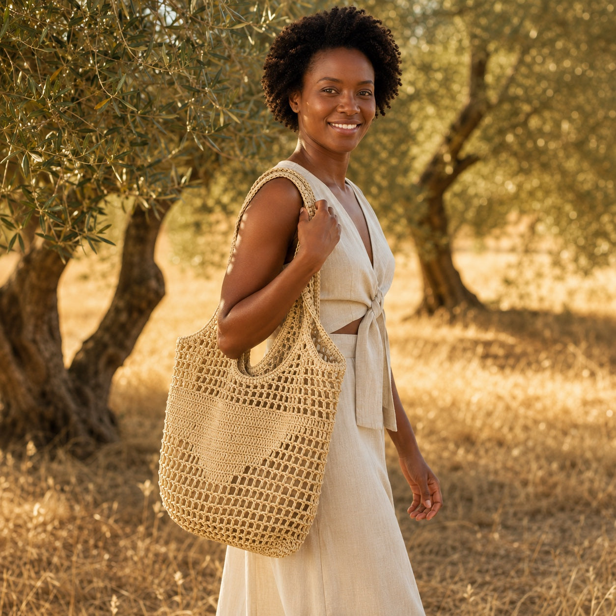 Model wearing the Mondello - Rattan Tote Bag, side view