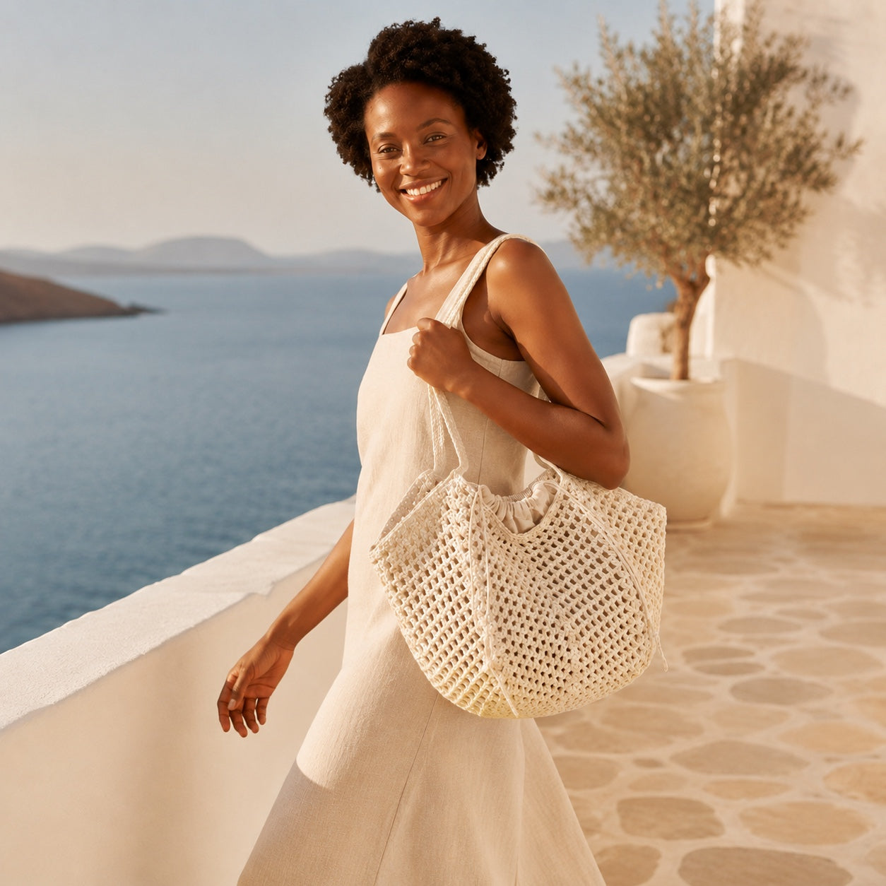 Model wearing the Porec - Woven Beach Tote, side view
