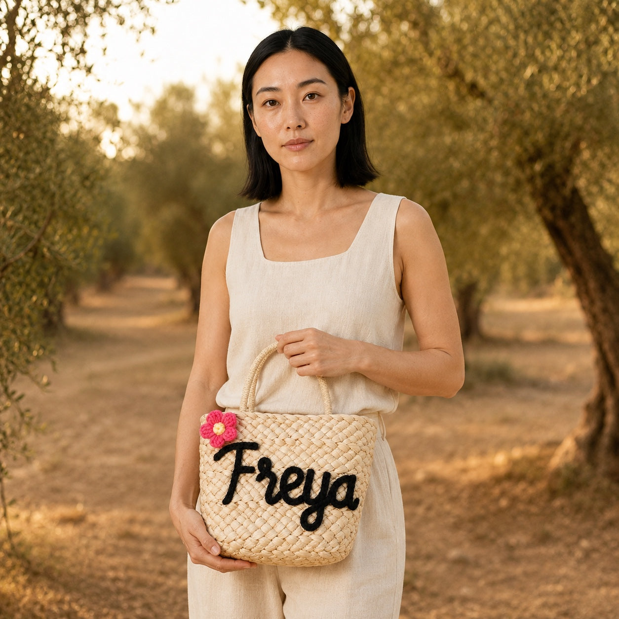 Model carrying the Split - Straw Bucket Bag